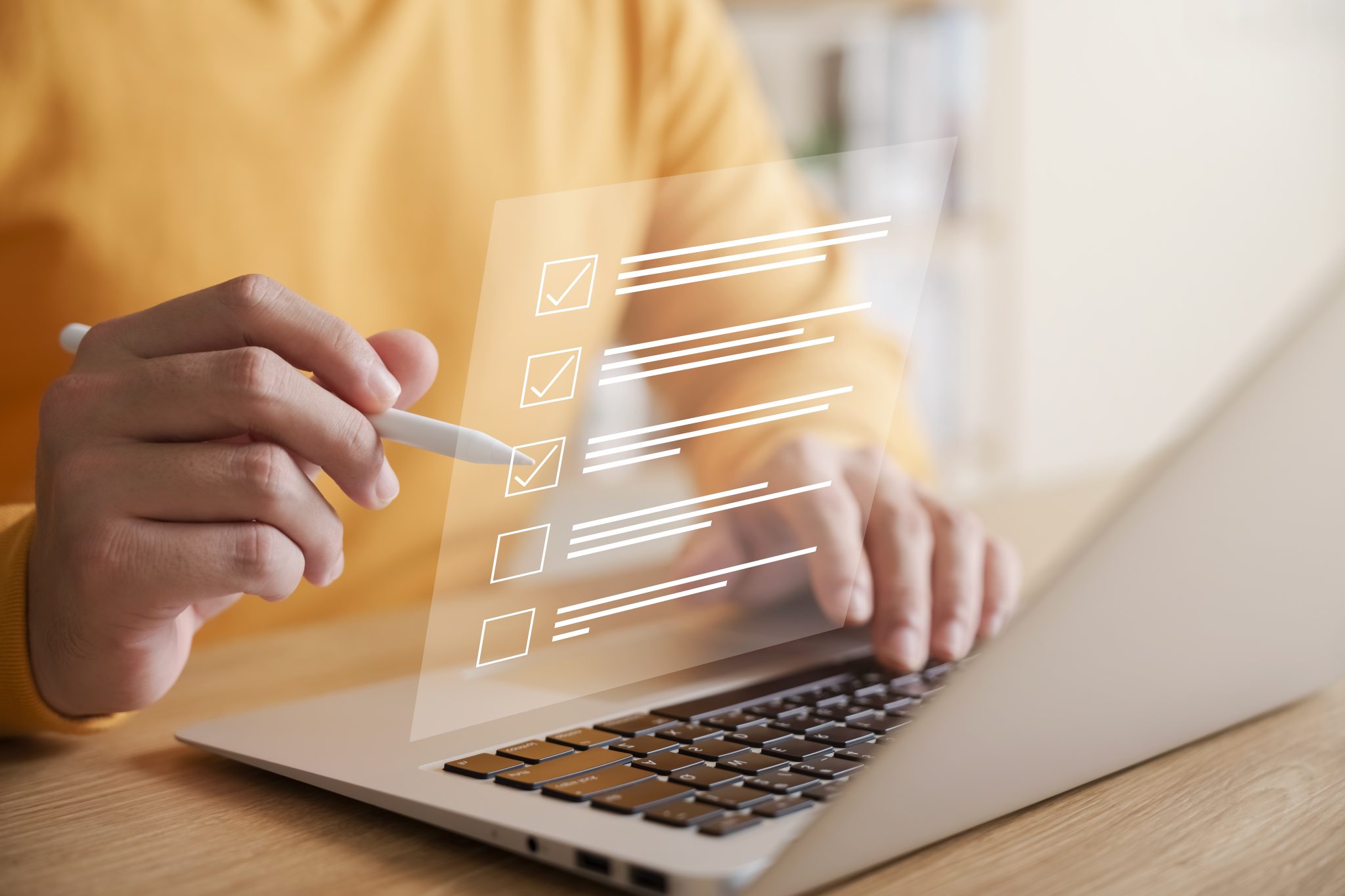 Business performance checklist concept, businessman using laptop